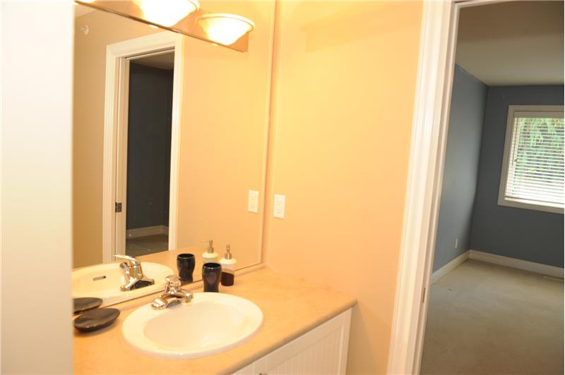 Bedroom with cheater bathroom