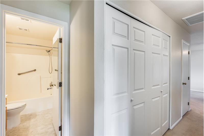 hall bath and laundry in closet