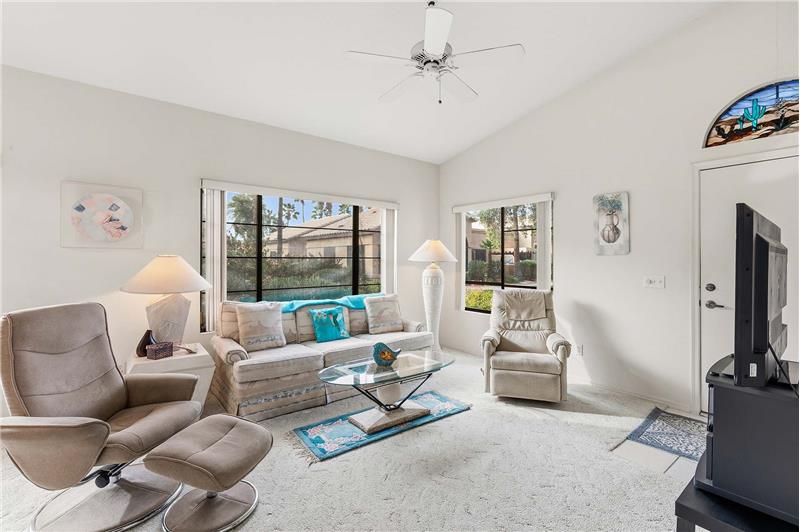 Living room with vaulted ceilings
