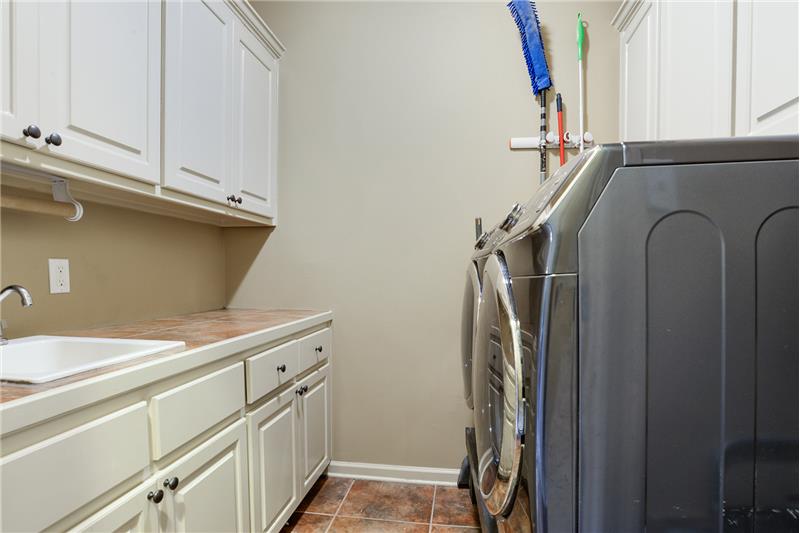 Laundry; counter space/sink and cabinet storage