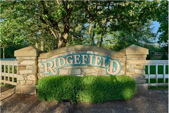 Community Entrance and Includes a Basketball Court and Play Yard.