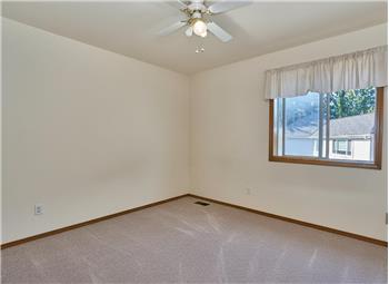 3rd Bedroom with Ceiling Fan and New Carpets