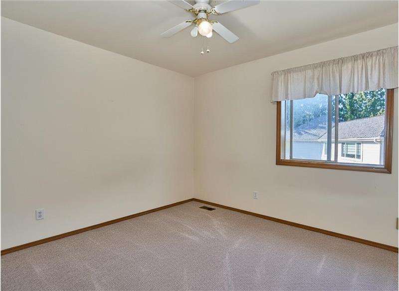 3rd Bedroom with Ceiling Fan and New Carpets