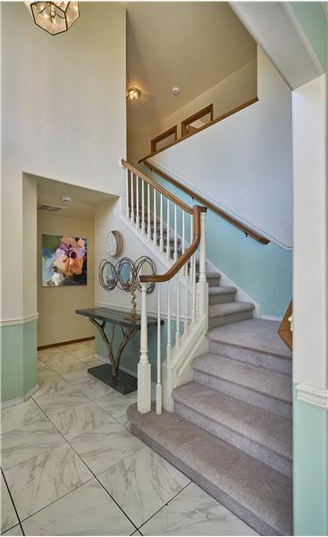 Entry and Custom Staircase at the Time of being built.