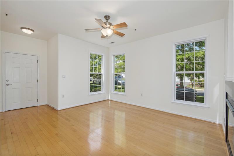 Living Room Looks Out to Neighboring Single Family Homes