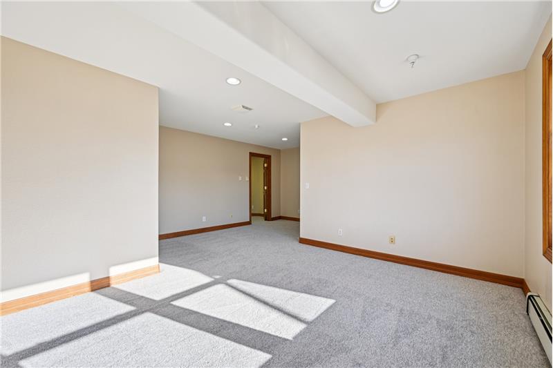 Reverse view of primary bedroom in basement