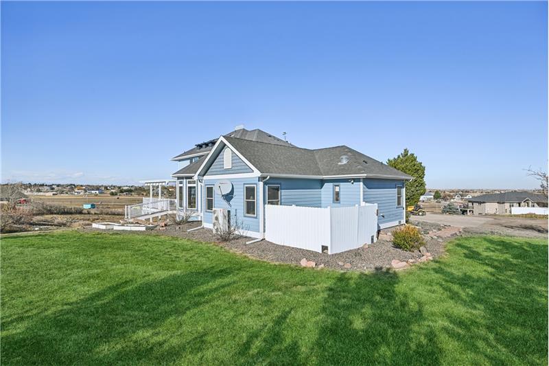 View from southwest - primary suite addition with enclosed patio
