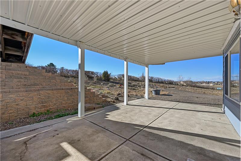 Patio outside the basement unit has a 