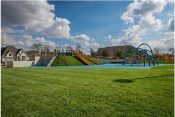 Play area is 3 doors down from this home.