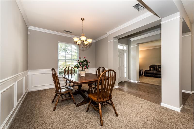 Dining room has plenty of room for larger table, side-board. Open sight lines to foyer and living room.