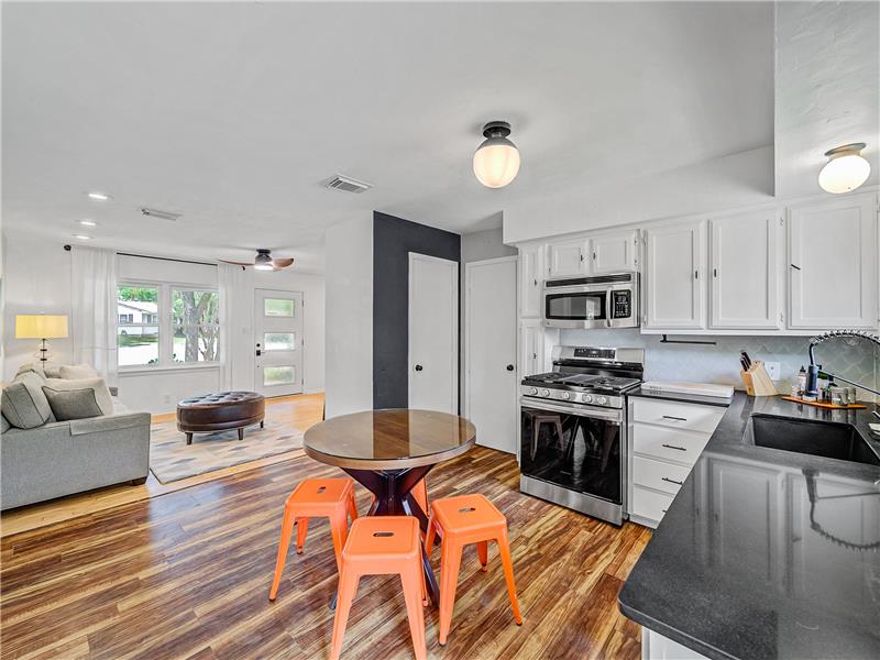 Easy care floors in this adorable kitchen