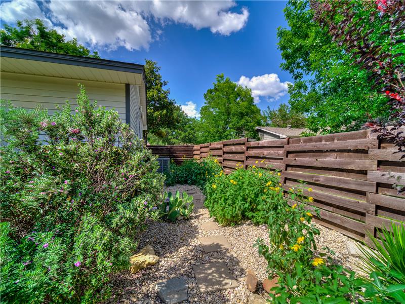 Beautifully landscaped with heat tolerant native vegetation