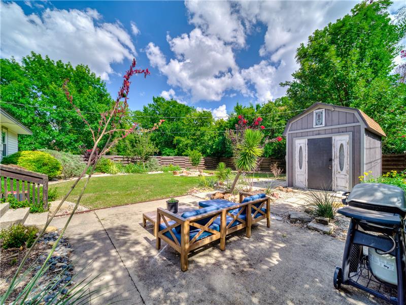 Storage shed and open patio for gathering 