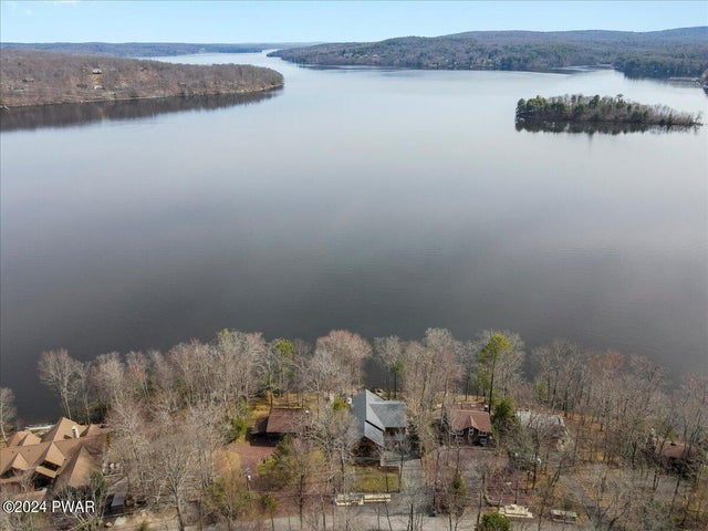 Ariel Shot Of House Looking Out To Lake