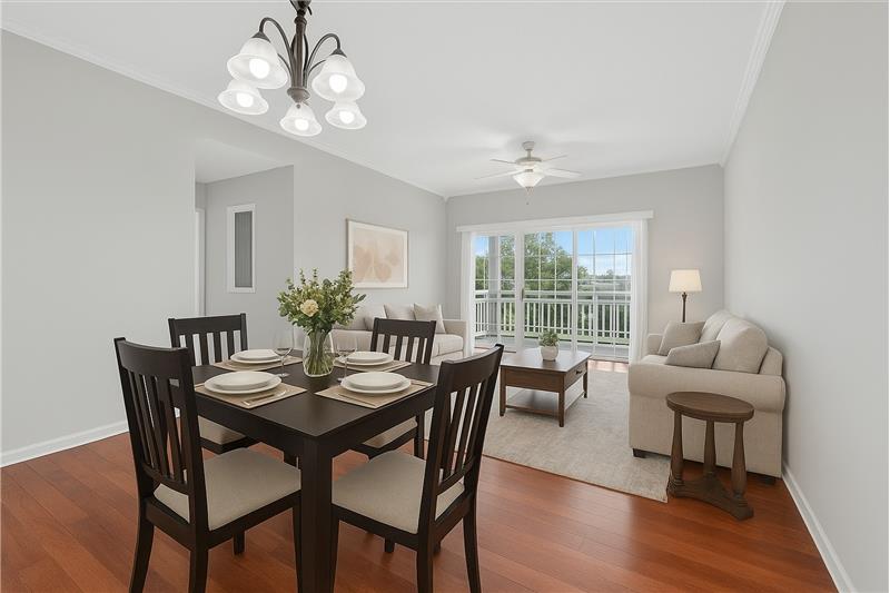 Virtually staged great room/dining area