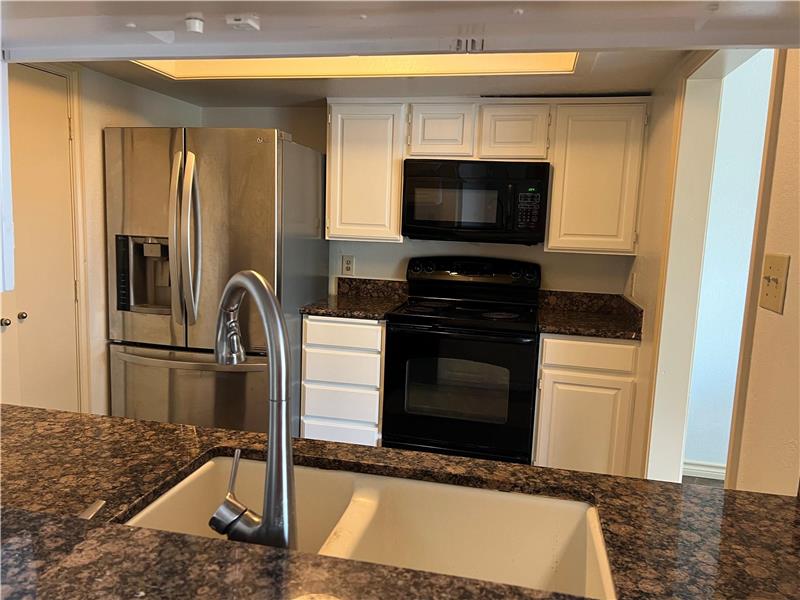 Stainless Refrigerator & Washer Dryer for the Tenant to use. Granite Counter tops.