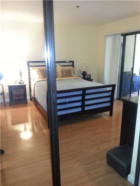 Master bedroom with patio to center gardens