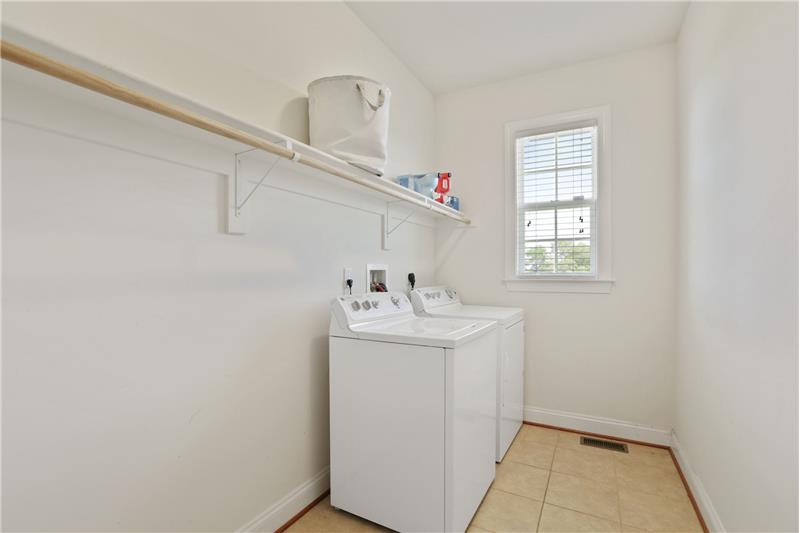 Laundry Room behind Kitchen by Garage Door Entrance