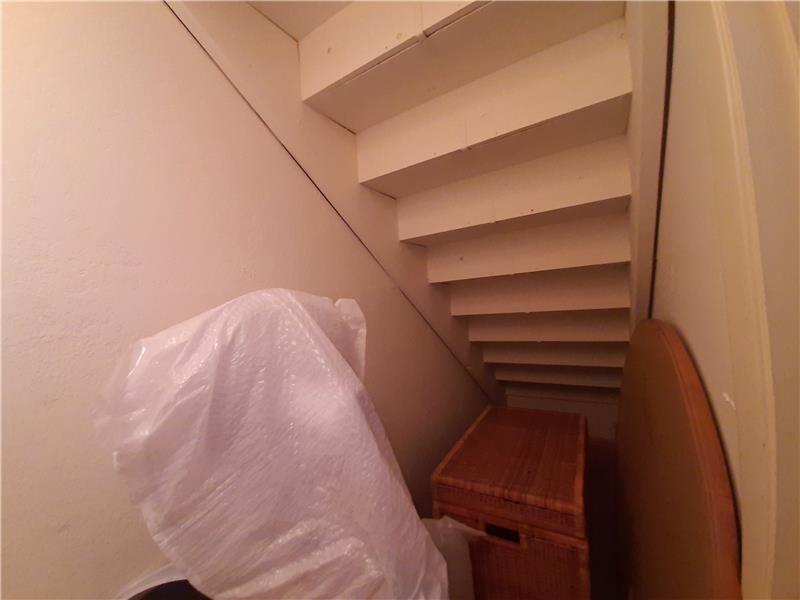 Additional Storage underneath Staircase accessed from Master Bedroom:  NO wasted space!!  Smart!