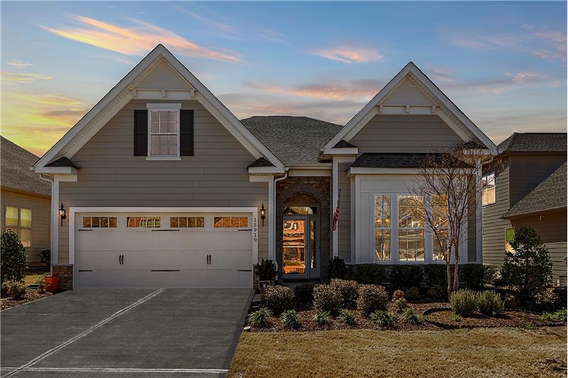 Welcome home to easy living in a vibrant Active Adult community on the shores of Lake Wylie.