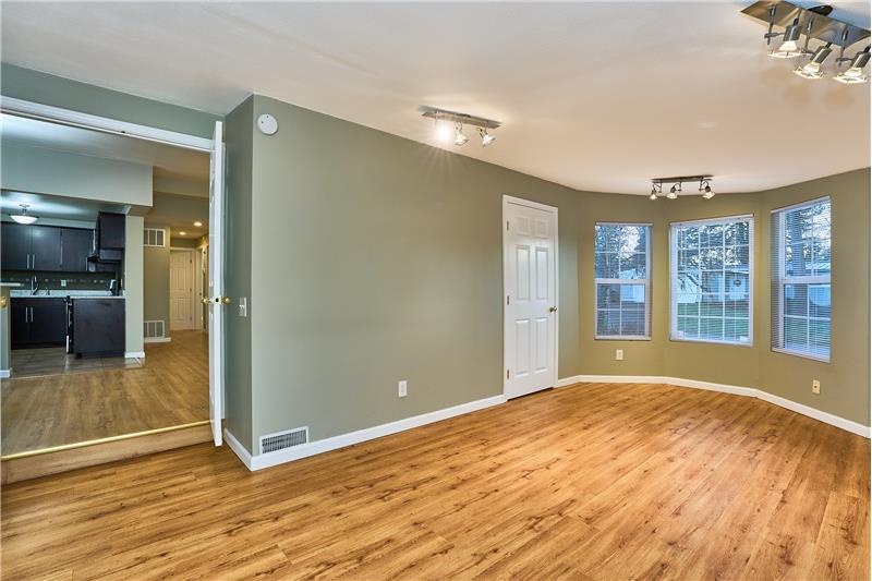 Light and Bright Main Floor Garage Converted into a Large Bedroom.