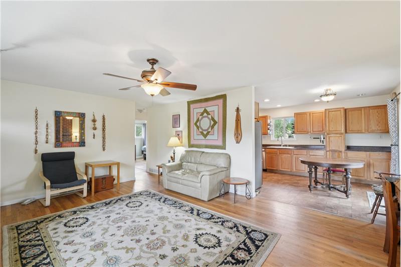 Living room with kitchen beyond