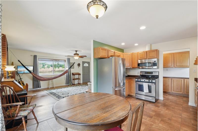 Eat-in kitchen with living room at left