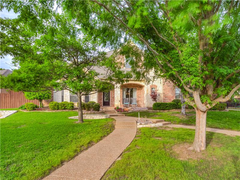 View of property featuring a front yard