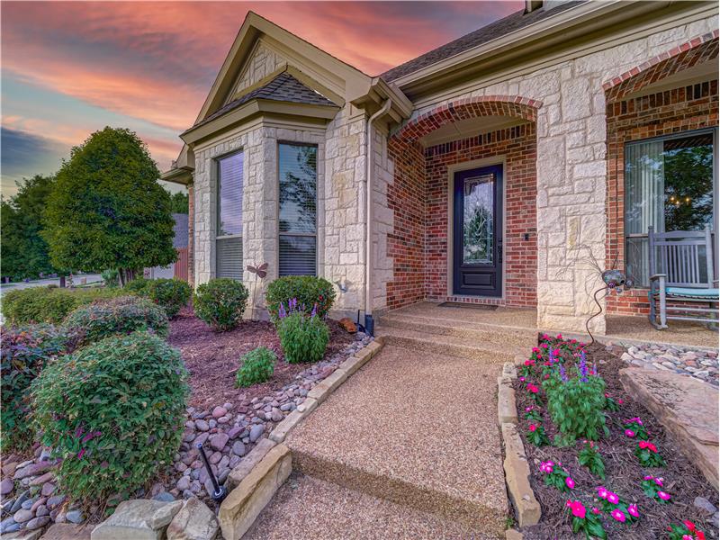 View of exterior entry at dusk