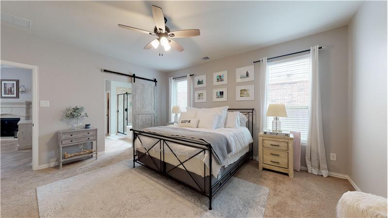 Beautiful master bedroom with room for all your furniture needs!