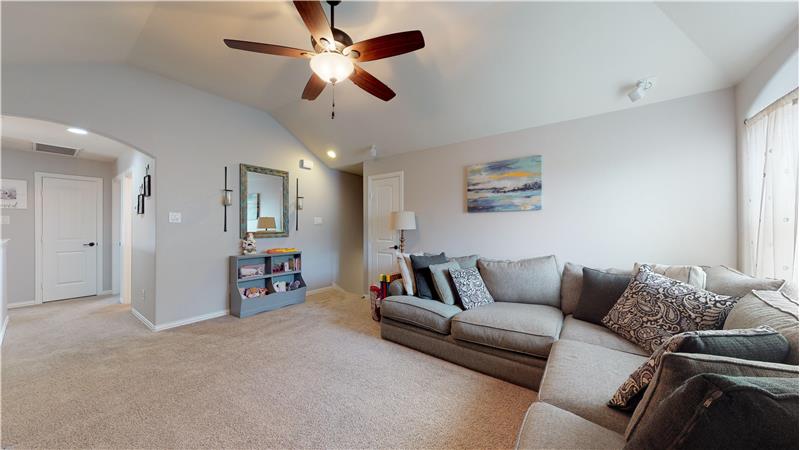 Large upstairs game room has ample space for whatever your family may need!!