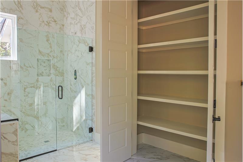 Linen closet in primary bathroom