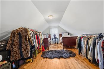 Finished loft area. ideal for guest room, den/ office, playroom- additional storage area