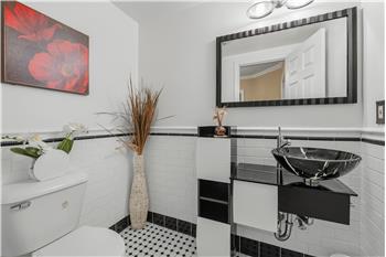 Stylish Powder Room/ Guest bath conveniently located on first level