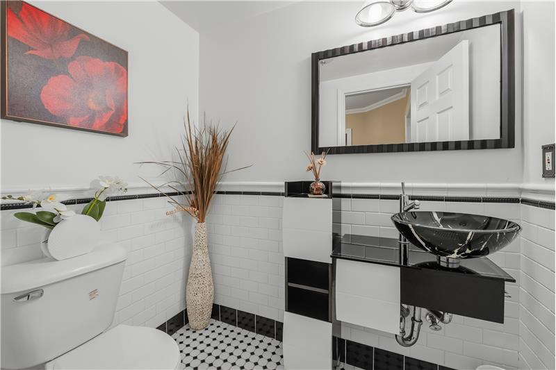 Stylish Powder Room/ Guest bath conveniently located on first level