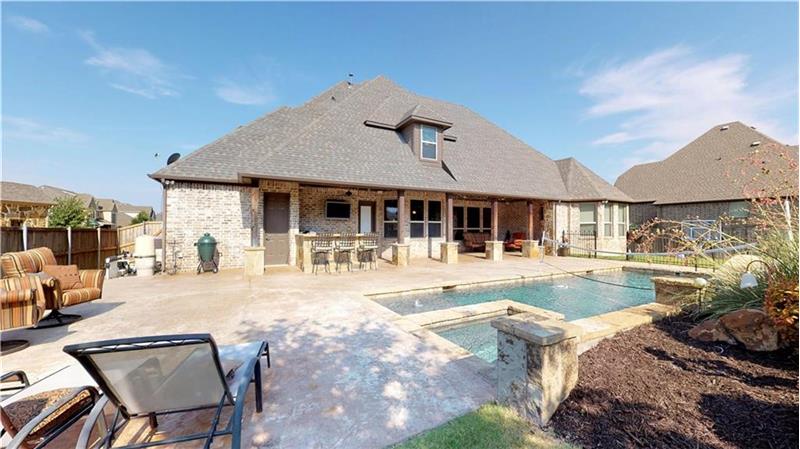 Play pool, outdoor kitchen, almost a half acre!