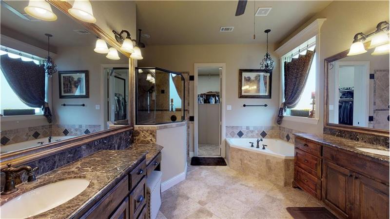 Huge master bath with large walk in shower and master closet