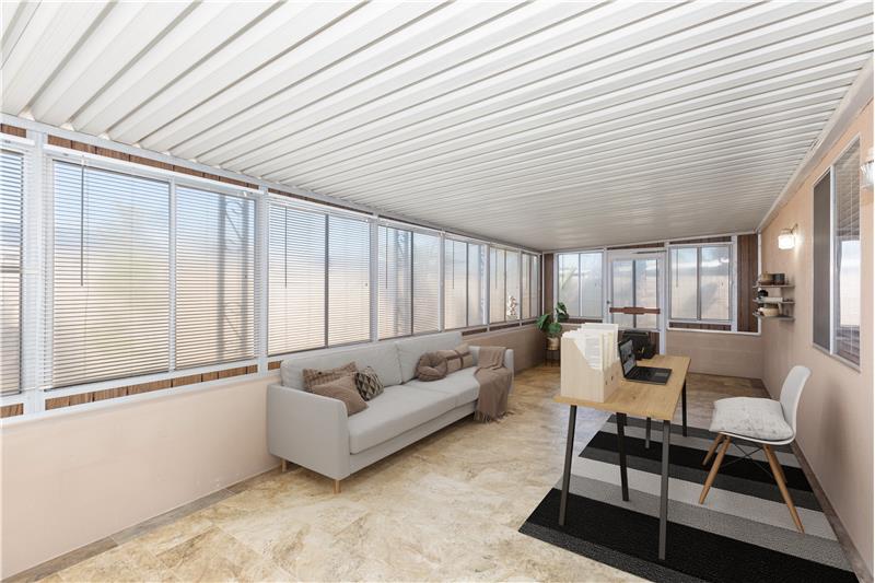 VIRTUALLY STAGED - sun room as office