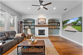You'll Love this spacious family room with Gas Fireplace and Mantle