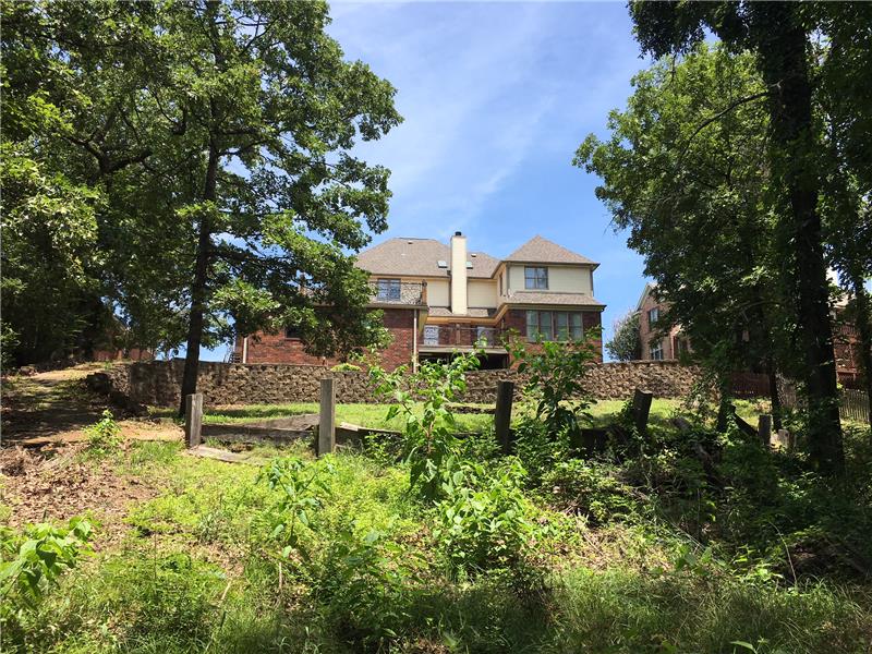 Back view sloping to level with creek at bottom