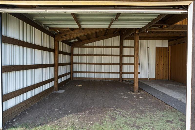 Inside of the Huge Detached RV and Two Car Garage. Great for working on cars, wood shop and shorage.