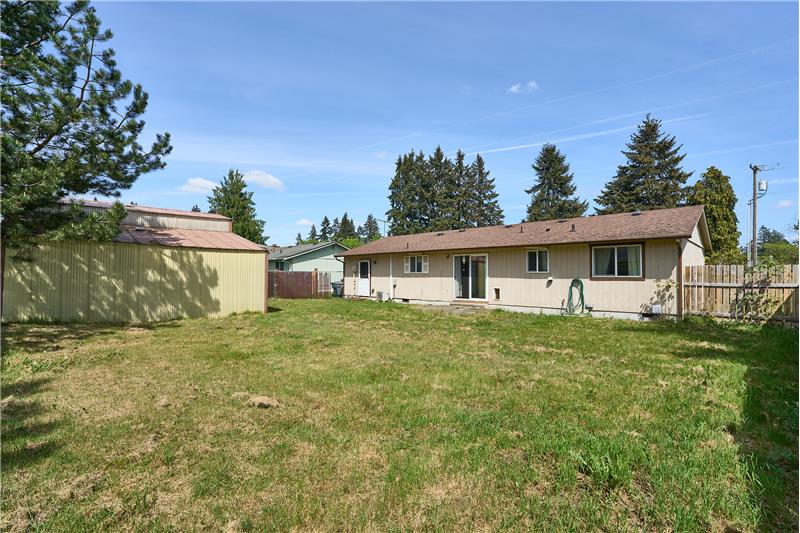 Large Fully Fenced Backyard.