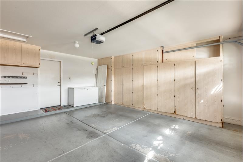 garage with wall cabinets