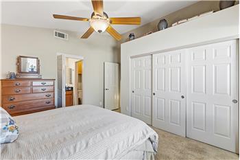 master bedroom with triple closet