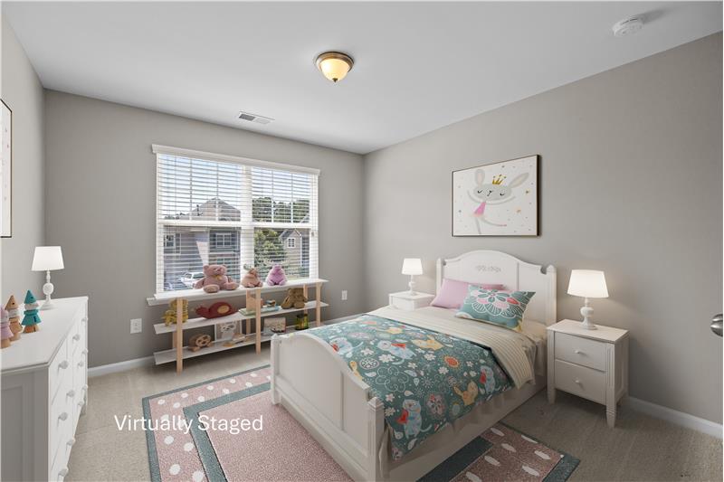 One of three additional bedrooms on home's second floor