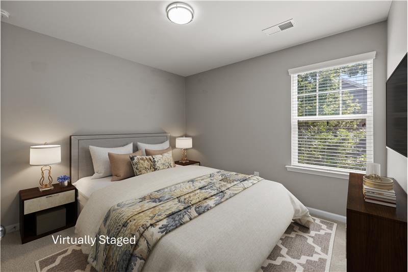 One of three additional bedrooms on home's second floor