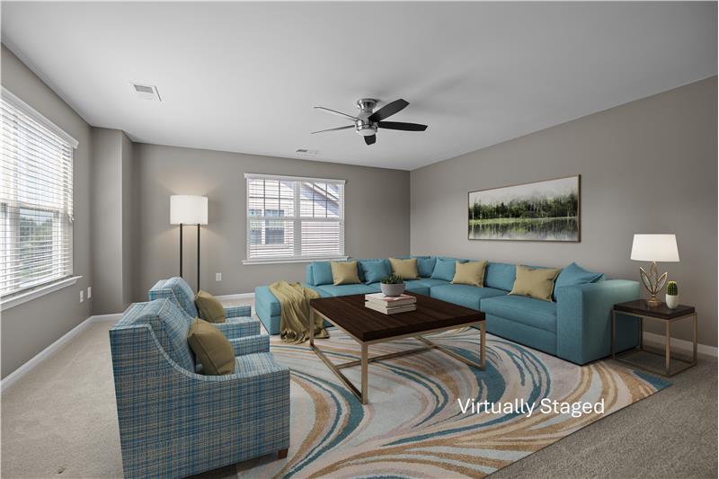 Bright and versatile bonus room perfect for exercise, homeschooling, crafts, or recreation