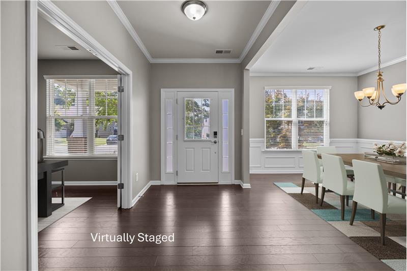 Entrance sets the tone for the home’s modern elegance and timeless character