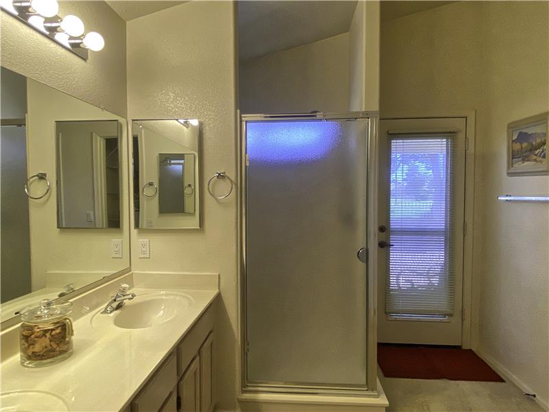 walk in shower, door to back patio