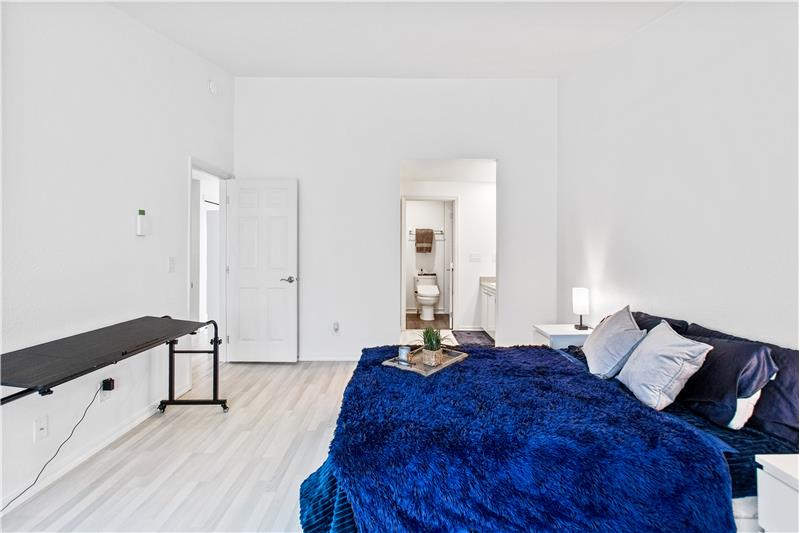 From the primary bedroom, there is a spacious Jack and Jill bath with dual access, perfect for guests.